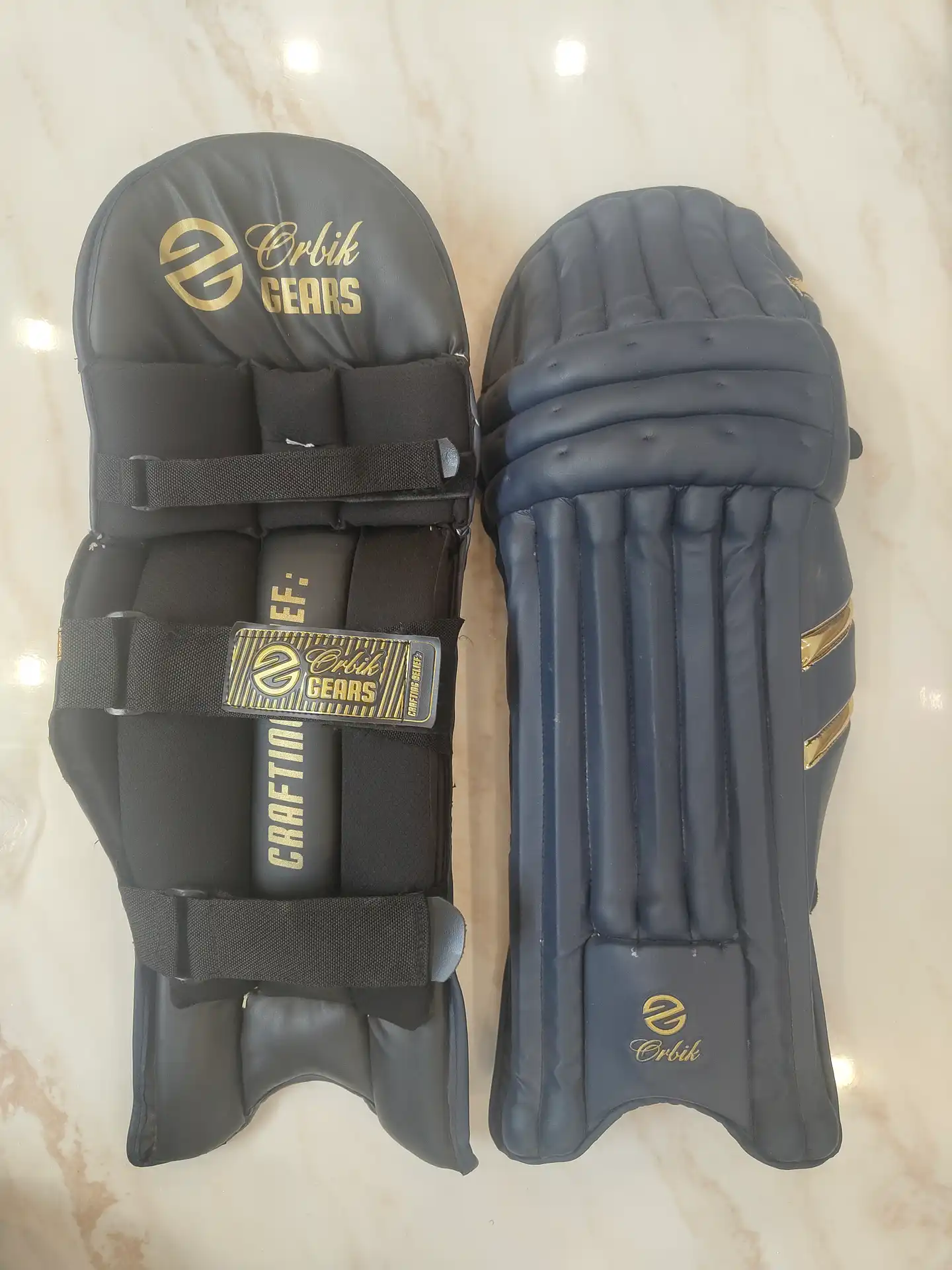 Tyros cricket batting pads by Orbik Sports